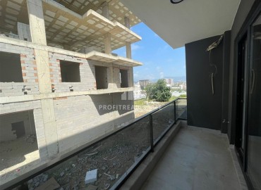 One bedroom apartment, 55m², in a comfortable residence under construction in the Payallar area, Alanya ID-16562 фото-7