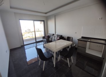 Partially furnished one-bedroom apartment, 60m², in a new residence with hotel facilities in Mahmutlar, Alanya ID-16573 фото-3