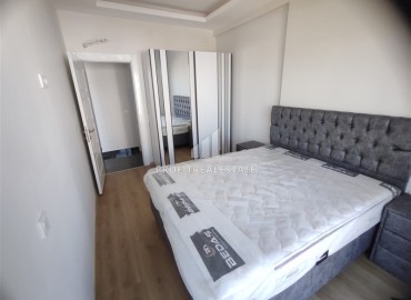 Partially furnished one-bedroom apartment, 60m², in a new residence with hotel facilities in Mahmutlar, Alanya ID-16573 фото-4