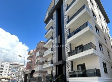 New apartment 1+1, unfurnished, fully finished and equipped with a kitchen, 400 meters from the sea, Mahmutlar, Alanya ID-16579 фото-1