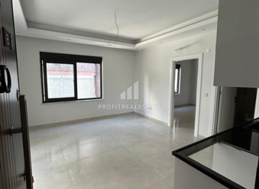 Новая квартира 1+1, без мебели, с чистовой отделкой и кухонным гарнитуром, в 400 метрах от моря, Махмутлар, Аланья ID-16579 фото-2