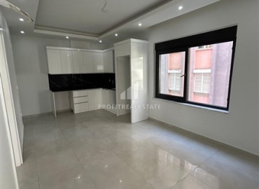 Новая квартира 1+1, без мебели, с чистовой отделкой и кухонным гарнитуром, в 400 метрах от моря, Махмутлар, Аланья ID-16579 фото-4