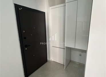 Новая квартира 1+1, без мебели, с чистовой отделкой и кухонным гарнитуром, в 400 метрах от моря, Махмутлар, Аланья ID-16579 фото-6