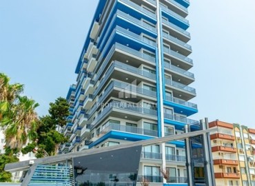 Furnished two bedroom apartment on the first coastline, in a residence with facilities, Mahmutlar, Alanya ID-16595 фото-1
