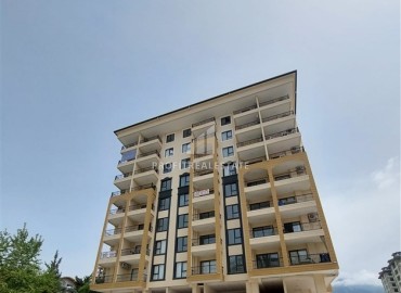 Новая двухкомнатная квартира 56м² без мебели, в 550 метрах от моря, в комплексе с инфратсрутурой, Махмутлар, Аланья ID-16597 фото-1