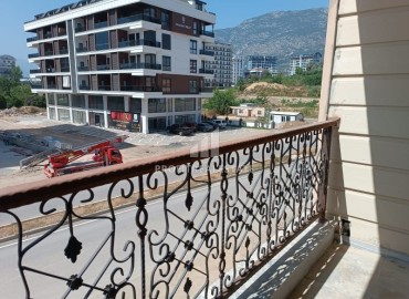 Inexpensive new one bedroom apartment, unfurnished, fully finished, in a new building with facilities, Mahmutlar, Alanya ID-16661 фото-10