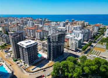 One bedroom apartment, 60m², in a comfortable new building with a winter pool in Mahmutlar, 450m from the sea ID-16676 фото-16