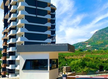 One bedroom apartment, 65m², furnished, in a residence with facilities, in Mahmutlar area, Alanya ID-16680 фото-1