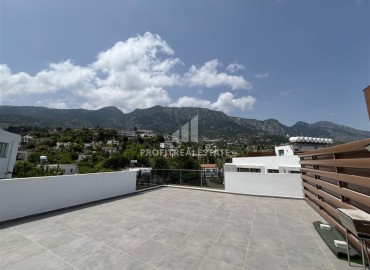 Bright furnished apartment 2+1, with sea and mountain views, in a modern residence with a swimming pool, Lapta, Northern Cyprus ID-16697 фото-16