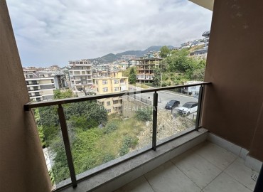 New 3+1 apartment with sea views, unfurnished, with a separate kitchen with built-in fittings, in the center of Alanya ID-16703 фото-13