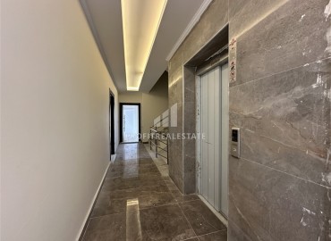 New 3+1 apartment with sea views, unfurnished, with a separate kitchen with built-in fittings, in the center of Alanya ID-16703 фото-19