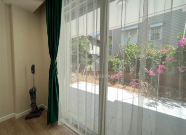 Furnished 1+1 apartment with a modern interior and a private garden terrace, Lara, Antalya ID-16720 фото-4