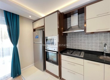 Furnished 1+1 apartment with a modern interior and a private garden terrace, Lara, Antalya ID-16720 фото-7