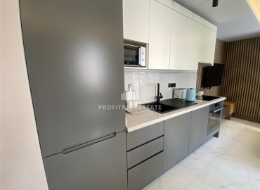 Меблированная двухкомнатная квартира, 50м² в центре Алании, в современном комплексе с инфраструктурой ID-16737 фото-3