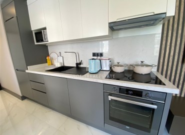 Furnished one-bedroom apartment, 50m² in the center of Alanya, in a modern residence with facilities ID-16737 фото-4