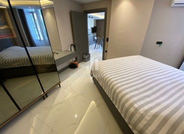 Furnished one-bedroom apartment, 50m² in the center of Alanya, in a modern residence with facilities ID-16737 фото-11