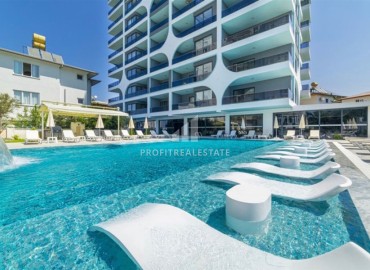 Elegant one bedroom apartment, 52m² in a residence with hotel facilities in Mahmutlar, Alanya ID-16750 фото-1