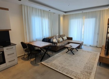 Elegant one bedroom apartment, 52m² in a residence with hotel facilities in Mahmutlar, Alanya ID-16750 фото-5