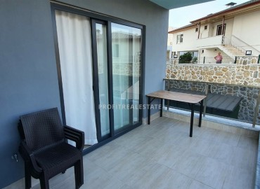 Elegant one bedroom apartment, 52m² in a residence with hotel facilities in Mahmutlar, Alanya ID-16750 фото-14