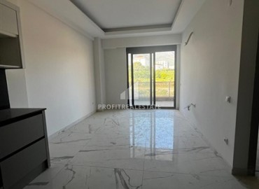 Inexpensive new apartment just 500 meters from the sea, 1+1, 55m², fully finished, in a new building, Mahmutlar, Alanya ID-16754 фото-2