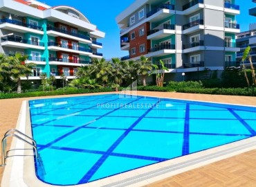 Magnificent furnished apartment with a separate kitchen and a glazed balcony in a residence with facilities, Oba, Alanya ID-16756 фото-1