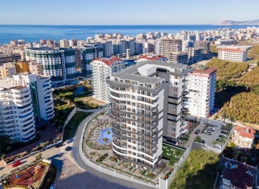 One-bedroom apartment 63m² at an attractive price in a new building at the final stage of construction, Mahmutlar, Alanya ID-16759 фото-12