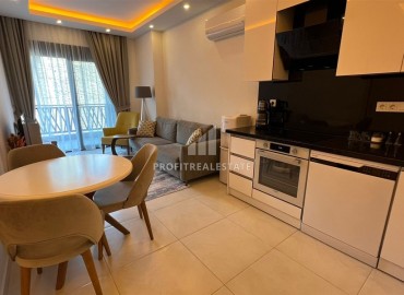 Elegant one bedroom apartment, 55m², in a luxury new building in Mahmutlar, 650m from the sea, Alanya ID-16768 фото-4