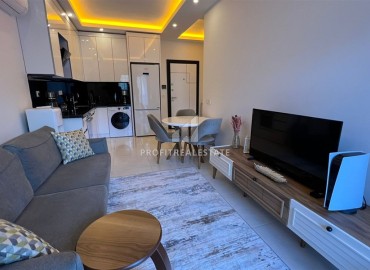 Elegant one bedroom apartment, 55m², in a luxury new building in Mahmutlar, 650m from the sea, Alanya ID-16768 фото-5