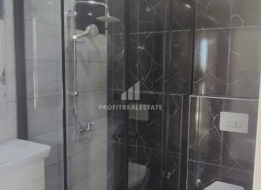 Квартира с двумя спальнями, 80м², в новом комфортабельном комплексе в районе Енишехир, Чифтликкёй ID-16774 фото-13