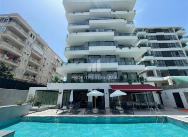 One-bedroom apartment, 60m², in a new building with a wonderful location in the center of Alanya, 150m from the sea ID-16663 фото-14