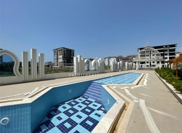 New 1+1 apartment with an excellent layout, 200 meters from the sea, a new building with extensive facilities, in green Gazipasa, Alanya ID-16784 фото-19