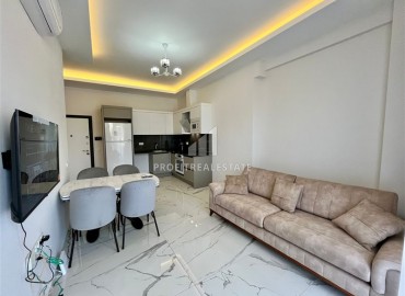 Furnished one bedroom apartment, 55m², in a comfortable new building in Mahmutlar, Alanya ID-16787 фото-2