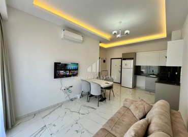 Furnished one bedroom apartment, 55m², in a comfortable new building in Mahmutlar, Alanya ID-16787 фото-7