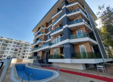 New apartment 1+1, 55m². in a comfortable new building in Mahmutlar, Alanya at a great price ID-16798 фото-1