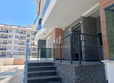 New apartment 1+1, 55m². in a comfortable new building in Mahmutlar, Alanya at a great price ID-16798 фото-16