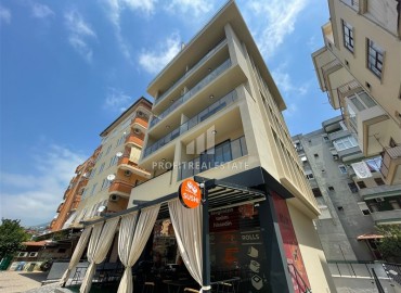 One-bedroom apartment 58m², in a new building at the final stage of construction, 400 meters from the sea, in the center of Alanya ID-15793 фото-1