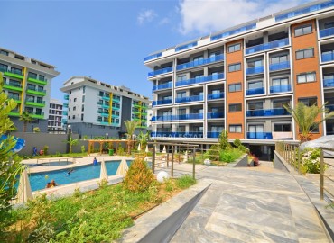 Уютная двухкомнатная квартира, 55м², в новом комплексе премиум класса, в 150м от моря в Каргыджаке, Алания ID-16800 фото-1