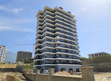 Inexpensive apartment 1+1, 54m², unfurnished, fully finished in a new building with facilities, Mahmutlar, Alanya ID-16814 фото-17