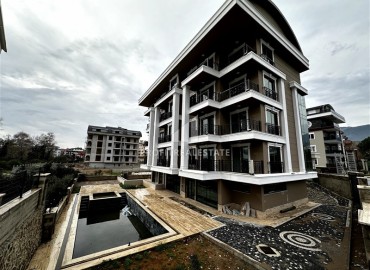 Двухкомнатная квартира, 50м², в резиденции с хорошей инфраструктурой на этапе строительства в Оба, Алания ID-12747 фото-1