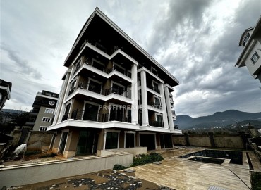 Двухкомнатная квартира, 50м², в резиденции с хорошей инфраструктурой на этапе строительства в Оба, Алания ID-12747 фото-16