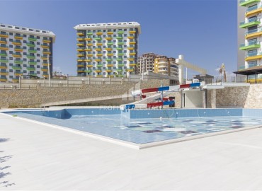 New 1+1 apartment with sea views, with high-quality finishing and kitchen units in Avsallar, Alanya ID-16825 фото-19