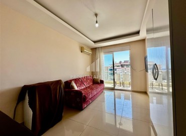 Inexpensive furnished studio apartment 30m², with sea views, in a residence with a swimming pool, Mahmutlar, Alanya ID-16827 фото-2