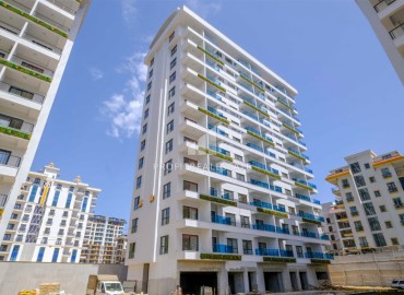 Апартаменты 1+1, 60м², в элитном комплексе на окончательном этапе строительства в районе Махмутлар, Алания ID-16828 фото-1