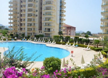 Апартаменты планировки 2+1 в большом зеленом комплексе с бассейном и богатой инфраструктурой в районе Махмутлар ID-1301 фото-16