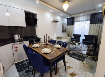 Luxurious 1+1 apartment with a stylish interior in a residence with the facilities of a five-star hotel, Mahmutlar, Alanya ID-16852 фото-4