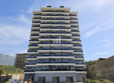 Inexpensive one bedroom apartment at the final stage of construction, in a new building with facilities, Mahmutlar, Alanya ID-15827 фото-2