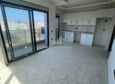 Inexpensive one bedroom apartment at the final stage of construction, in a new building with facilities, Mahmutlar, Alanya ID-15827 фото-6