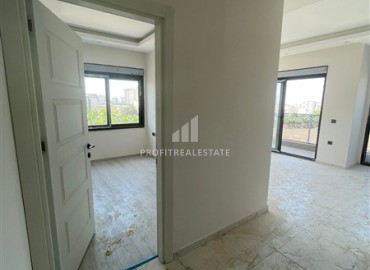 Inexpensive one bedroom apartment at the final stage of construction, in a new building with facilities, Mahmutlar, Alanya ID-15827 фото-12