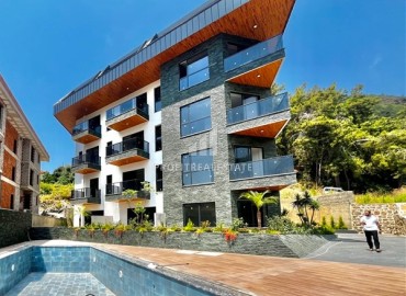 Солнечная квартира 1+1 по цене ниже рынка, на завершающем этапе строительства, в современном комплексе, Хасбахче, Аланья ID-16894 фото-1