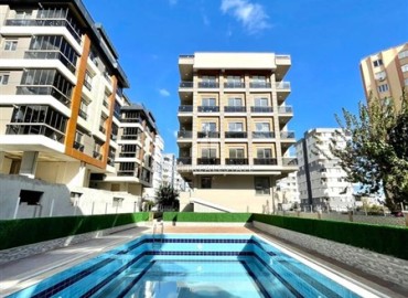 Two bedroom apartment unfurnished, 85 m², with natural gas and built-in kitchen, in a residential residence with a swimming pool, Sarisu, Antalya ID-16895 фото-15